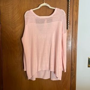Soft baby pink sweater with deep v in back that ties.